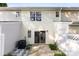 Backyard featuring sliding glass door, air conditioning unit, stone pavers and privacy fence at 12536 Hennigan Place Ln, Charlotte, NC 28214