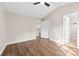 Bright bedroom featuring wood floors, vaulted ceiling, and neutral walls at 12536 Hennigan Place Ln, Charlotte, NC 28214