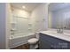 Bright bathroom featuring a tub-shower combination with tile surround, and white vanity at 1326 31St St, Conover, NC 28613