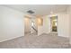 Upstairs loft area with carpeted floor and view of hallway and rooms at 1326 31St St, Conover, NC 28613