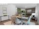 Elegant dining room with modern table and chairs, and decorative accents at 134 Rustling Waters Dr, Mooresville, NC 28117