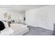 Spacious main bedroom with plush carpeting, neutral decor, and ample natural light at 134 Rustling Waters Dr, Mooresville, NC 28117
