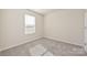 Well-lit bedroom featuring plush carpet, ample natural light, and a cozy atmosphere for relaxation at 1342 31St St, Conover, NC 28613