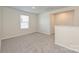A carpeted room with ample natural light, offering a cozy and inviting atmosphere at 1342 31St St, Conover, NC 28613