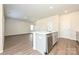 Kitchen island features a dishwasher and sink overlooking the open floor plan, enhancing flow and functionality at 1342 31St St, Conover, NC 28613