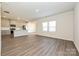 Bright open-concept living space showcases modern vinyl plank flooring and lots of natural light at 1342 31St St, Conover, NC 28613