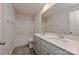 Well-lit bathroom showcasing a double vanity, tub and shower combo, and tile flooring at 1350 31St St, Conover, NC 28613
