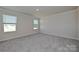 Bright bedroom featuring neutral walls, plush carpet, and large windows that provide natural light at 1350 31St St, Conover, NC 28613