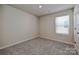 Cozy bedroom with neutral carpeting and a window for natural light at 1350 31St St, Conover, NC 28613