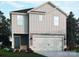 Charming two-story home features a two-car garage and professionally landscaped yard at 1350 31St St, Conover, NC 28613