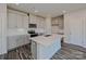 Modern kitchen boasts stainless steel appliances, gray cabinets, and a center island at 1350 31St St, Conover, NC 28613
