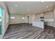 Open layout featuring a kitchen, living, and dining area with sliding glass door at 1350 31St St, Conover, NC 28613