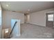 Spacious carpeted loft area with natural light and neutral tones, ideal for relaxation at 1350 31St St, Conover, NC 28613