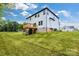 Backyard with a deck, sloping lawn, and privacy at 1500 Nectar Way # 32, Kannapolis, NC 28083