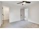 Bedroom with carpet floors, a ceiling fan, and closet at 1500 Nectar Way # 32, Kannapolis, NC 28083