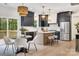Modern kitchen with dark cabinets, stainless steel appliances, and a breakfast nook at 1500 Nectar Way # 32, Kannapolis, NC 28083