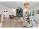 Spacious living room with a fireplace, a modern light fixture, and neutral decor at 1500 Nectar Way # 32, Kannapolis, NC 28083