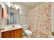 Bathroom with a butterfly patterned shower curtain, a neutral sink, and a vanity at 1605 Tate Rd # 258, Rock Hill, SC 29732