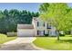 Charming two-story home featuring a two-car garage, well-manicured lawn, and traditional curb appeal at 1605 Tate Rd # 258, Rock Hill, SC 29732