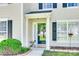 Close-up of the inviting front entrance, framed by lush greenery and attractive architectural details at 1605 Tate Rd # 258, Rock Hill, SC 29732