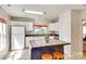 Functional kitchen featuring white cabinets, modern appliances, and a kitchen island at 1605 Tate Rd # 258, Rock Hill, SC 29732