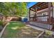 A fully fenced backyard featuring a covered patio, well-manicured lawn, and plenty of space for outdoor enjoyment at 1631 Amanda Ln, Rock Hill, SC 29730