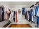Walk-in closet featuring ample storage, with rods, shelving, and hardwood floors at 1631 Amanda Ln, Rock Hill, SC 29730