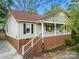Charming home with a brick foundation and inviting front porch at 1631 Amanda Ln, Rock Hill, SC 29730