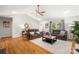 Bright living room with hardwood floors, a ceiling fan, and comfortable furniture at 1631 Amanda Ln, Rock Hill, SC 29730