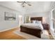 Spacious main bedroom showcasing a king-sized bed and a ensuite bathroom at 1631 Amanda Ln, Rock Hill, SC 29730