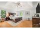 Large main bedroom with a king-sized bed and hardwood floors at 1631 Amanda Ln, Rock Hill, SC 29730