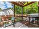Covered porch featuring wood beams, an outdoor rug, a wooden bench, and comfortable seating at 1631 Amanda Ln, Rock Hill, SC 29730