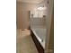 Bathroom featuring a soaking tub and a large mirror above the vanity at 165 Graceland Pl, Salisbury, NC 28146