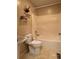 Bathroom with combined shower and tub, complemented by a toilet and sink with an accent wall shelf at 165 Graceland Pl, Salisbury, NC 28146