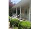 Front porch with white pillars, railing, and updated lighting for a welcoming curb appeal at 165 Graceland Pl, Salisbury, NC 28146