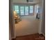 Spacious living room with plush carpeting, large windows, and access to outdoor living spaces at 165 Graceland Pl, Salisbury, NC 28146