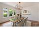 Dining room with hardwood floors and a view to the kitchen at 1804 Thomas Ave, Charlotte, NC 28205