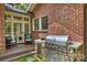 Outdoor kitchen and built-in grill area with a patio, perfect for entertaining at 1804 Thomas Ave, Charlotte, NC 28205