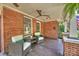 Relaxing covered porch with brick accents and comfortable seating at 1804 Thomas Ave, Charlotte, NC 28205