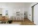 Beautiful open concept kitchen with an island, modern appliances, and a dining area at 1807 Kennesaw Dr, Charlotte, NC 28216