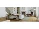 Comfortable living room featuring a fireplace, built-in shelving, and stylish modern furniture at 1807 Kennesaw Dr, Charlotte, NC 28216