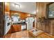 Functional kitchen with wooden cabinets and essential appliances at 1870 Sloan Rd, Mt Ulla, NC 28125