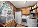 Organized laundry room with ample shelving and essential appliances at 1870 Sloan Rd, Mt Ulla, NC 28125