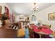 Bright living room with piano, round table and plush furniture at 1870 Sloan Rd, Mt Ulla, NC 28125
