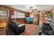 Cozy living room with wood paneling and a large window at 1870 Sloan Rd, Mt Ulla, NC 28125