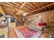 Cozy living room with wood paneling, offering a warm and inviting atmosphere at 1870 Sloan Rd, Mt Ulla, NC 28125