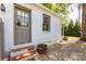 View of the side of the home with a small decorative area with decorative barrel at 2033 Charlotte Dr, Charlotte, NC 28203