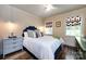 Bright bedroom with a comfortable bed, stylish decor, and plenty of natural light at 2033 Charlotte Dr, Charlotte, NC 28203