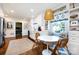 Charming breakfast nook features built-in seating and bright, airy design at 2033 Charlotte Dr, Charlotte, NC 28203