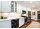Modern kitchen featuring white cabinets, stainless steel appliances, and sleek countertops at 2033 Charlotte Dr, Charlotte, NC 28203